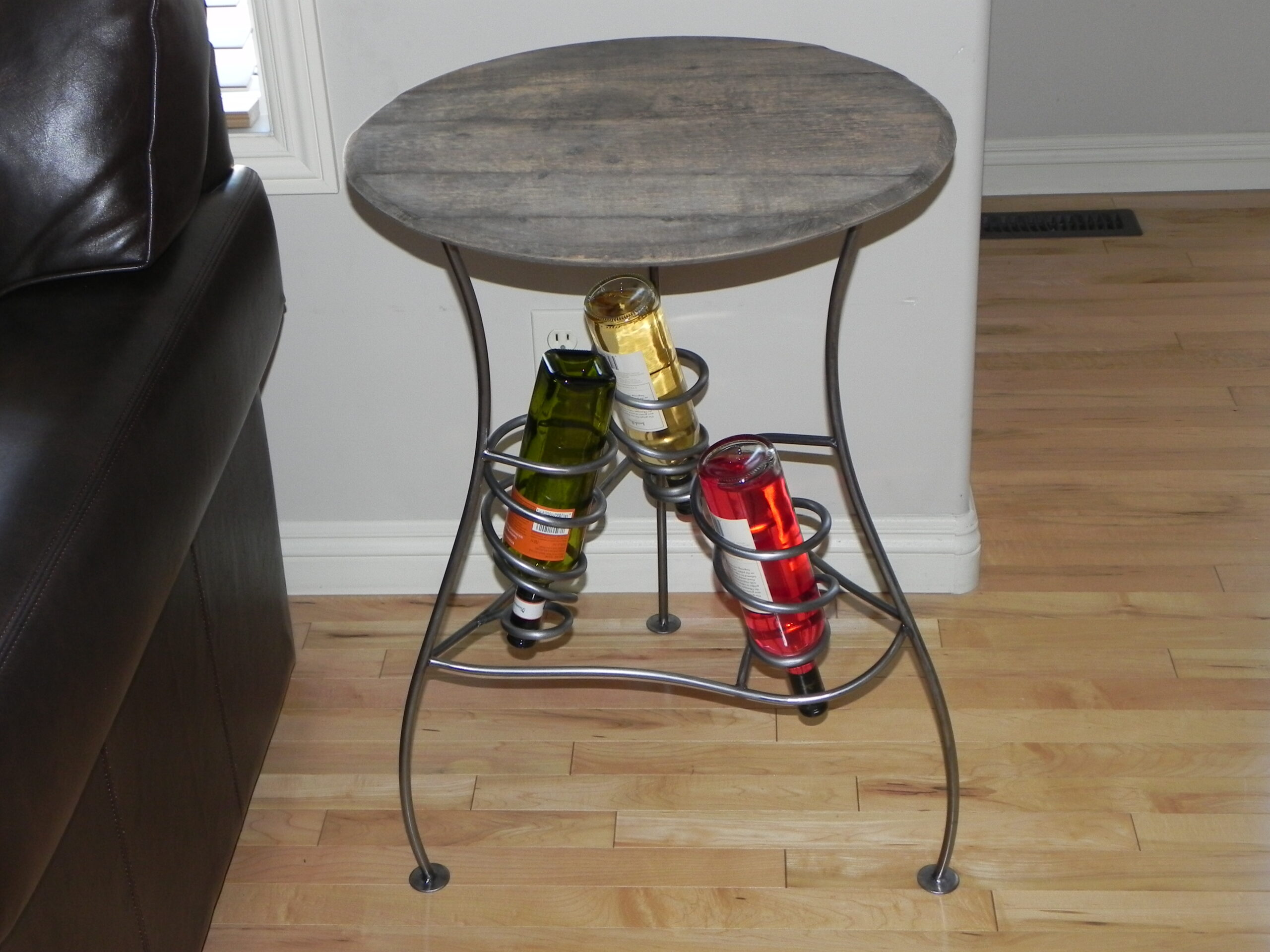 Iron Art wine console table with reclaimed whiskey barrel top