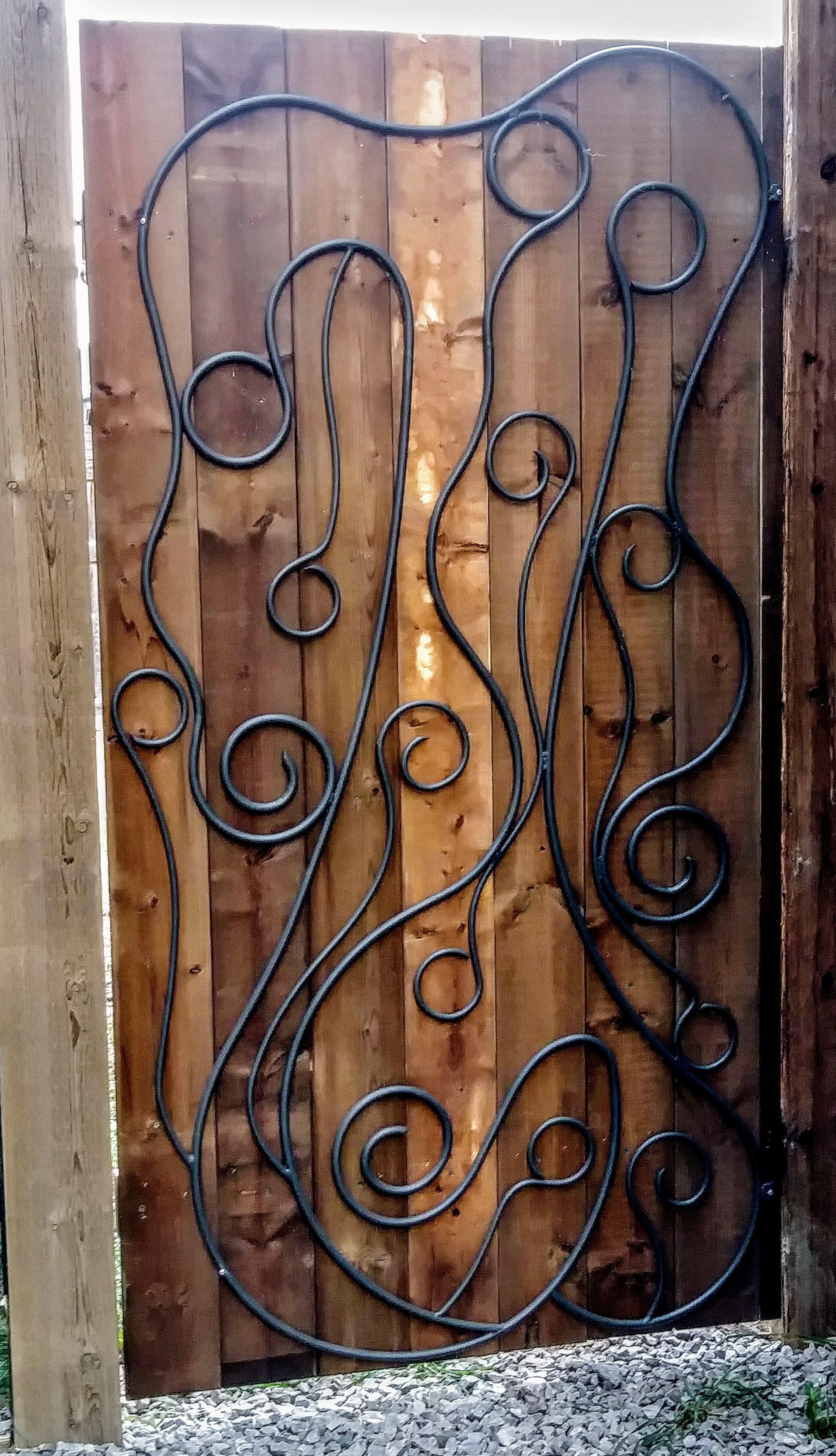 Take A Boring Wood Gate And Make It Amazing With Whimsical Iron Art