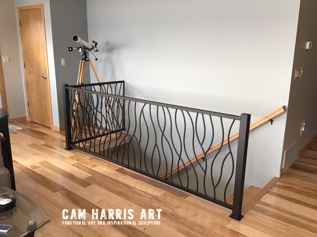 metal railing BENT design created by Cam Harris in Calgary Alberta