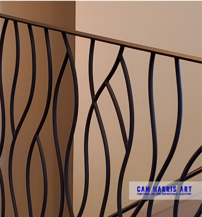 wrought iron railing BENT design close up