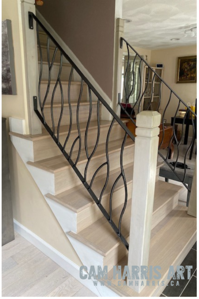 iron stair railing Bent Design created by Cam Harris in Calgary Alberta