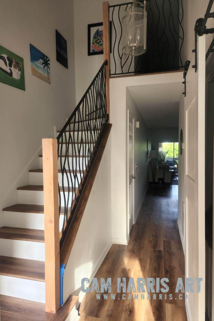 metal stair railing Bent Design created by Cam Harris in Calgary Alberta
